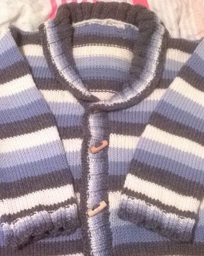 Child's cardigan in 100% pure wool
