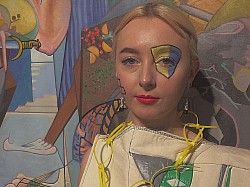 Edwin Lucas inspired tunic in front of one of his works at Edinburgh City Art Centre